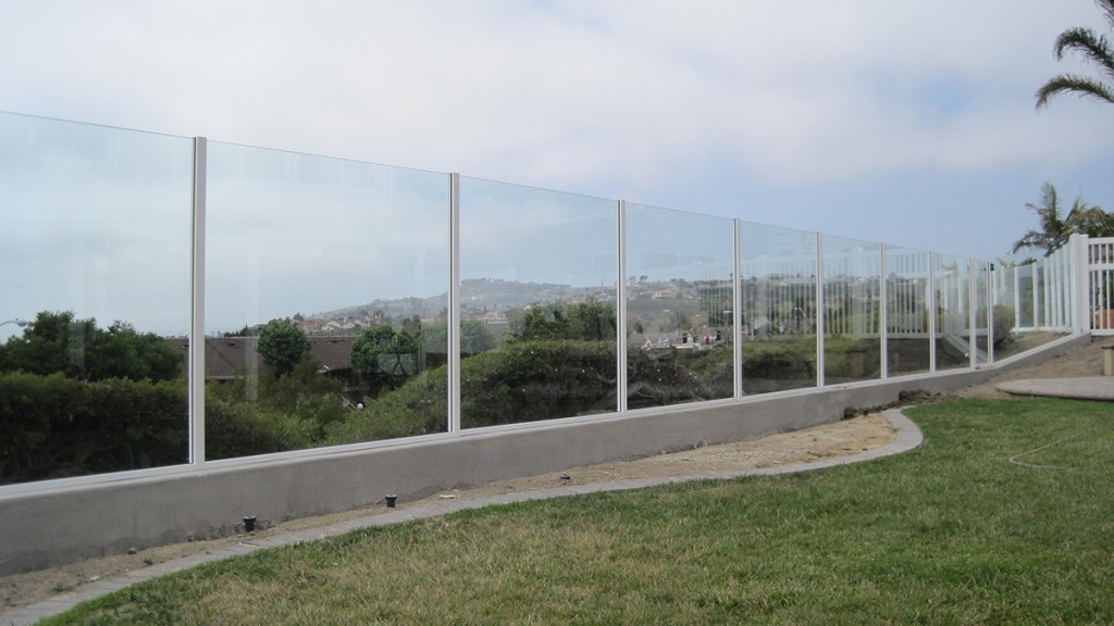 Framed glass fence wall for San Diego backyard