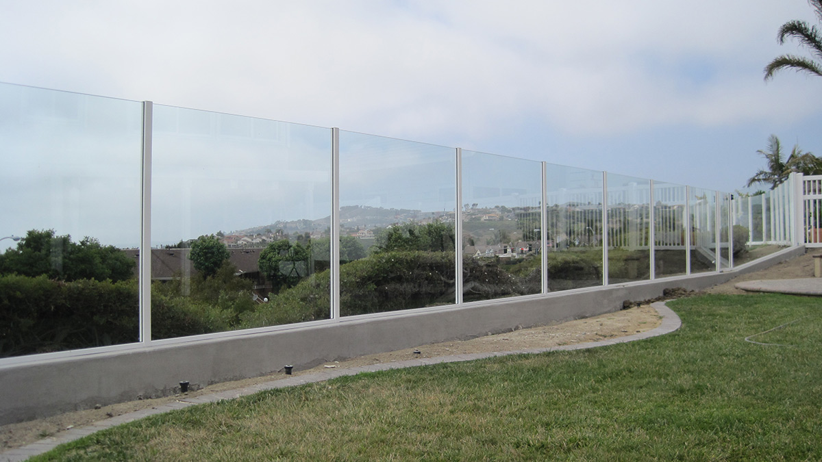 Framed glass fence wall for San Diego backyard
